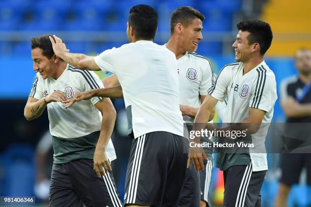 Andres Guardado, Raul Jimenez, Hector Moreno and Hirving Lozano of Mexico warm up during a training session ahead of the match against Korea as part...