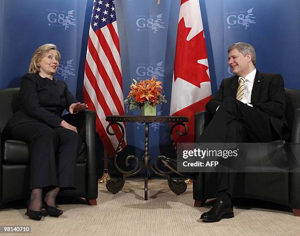 Canada Prime Minister Stephen Harper holds a meeting with US Secretary of State Hillary Clinton at the Chateau Cartier prior to meeting of the G8...