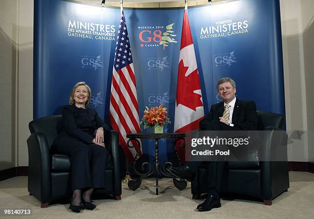 Canada Prime Minister Stephen Harper holds a meeting with U.S. Secretary of State Hillary Clinton at the Chateau Cartier prior to meeting of the G8...