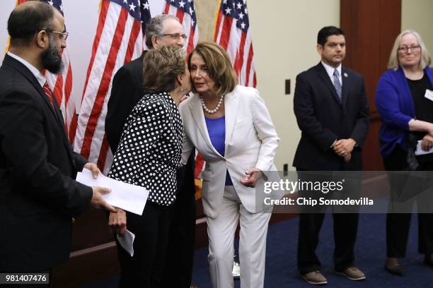 House Minority Leader Nancy Pelosi kisses Rep. Jan Schakowsky as she departs a news conference at the U.S. Capitol Visitors Center June 22, 2018 in...