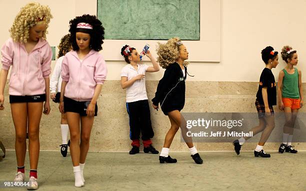 Dancers warm up before competing in the World Irish Dance Championships on March 30, 2010 in Glasgow, Scotland. As many as 4,500 dancers from 32...