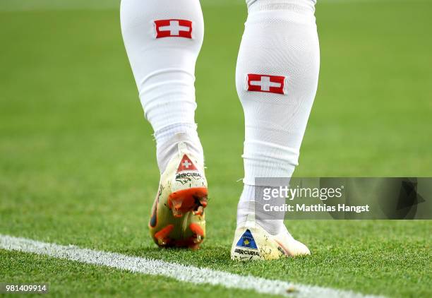 The Kosovo flag is seen on Xherdan Shaqiri of Switzerland's boots during the 2018 FIFA World Cup Russia group E match between Serbia and Switzerland...