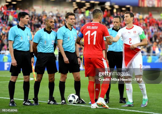 Aleksandar Kolarov of Serbia shakes hands with Stephan Lichtsteiner of Switzerland during the 2018 FIFA World Cup Russia group E match between Serbia...