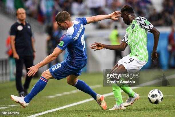 Wilfred Ndidi of Nigeria vies with Bjorn Sigurdarson of Iceland during the 2018 FIFA World Cup Russia Group D match between Iceland and Nigeria at...