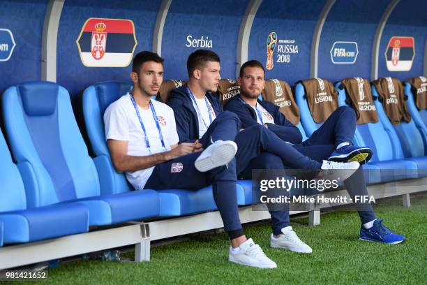 Marko Grujic of Serbia, Luka Jovic and Predrag Rajkovic of Serbia look on from the bench during the pitch inspection prior to the 2018 FIFA World Cup...