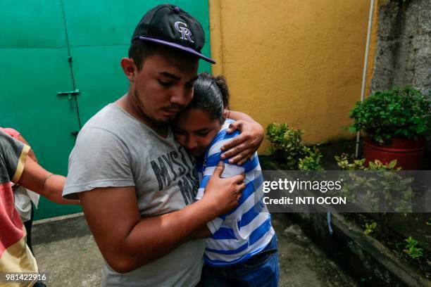 Man -who had been arrested in recent protests- is embraced by a relative after being released from jail in Masaya, Nicaragua on June 22, 2018. - Ten...