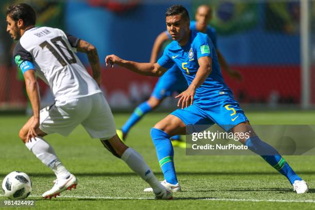 Bryan Ruiz of the Costa Rica national football team and Casemiro of the Brazil national football team vie for the ball during the 2018 FIFA World Cup...