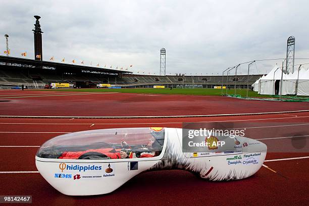 Dutch student tests drive a vehicle on March 30, 2010 at the Olympic Stadium in Amsterdam ahead of the Shell Eco-marathon on 7 and 8 May in Lausitz,...