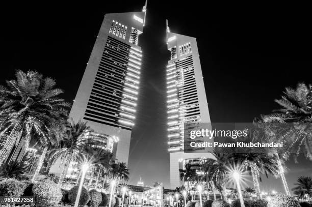 emirates towers - emirates towers stock pictures, royalty-free photos & images