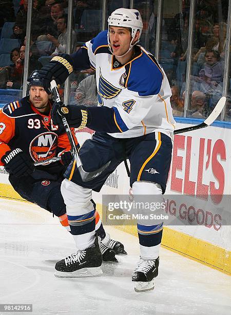 Eric Brewer of the St. Louis Blues skates against the New York Islanders on March 11, 2010 at Nassau Coliseum in Uniondale, New York. The Blues...