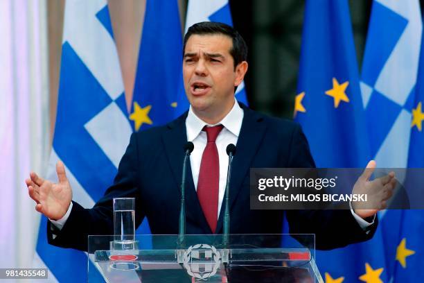 Greek Prime Minister Alexis Tsipras, wearing a tie, addresses the parliamentary group of leftist Syriza and coalition partner Independent Greeks in...