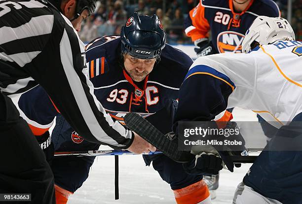 Doug Weight of the New York Islanders faces off against the St. Louis Blues on March 11, 2010 at Nassau Coliseum in Uniondale, New York. The Blues...