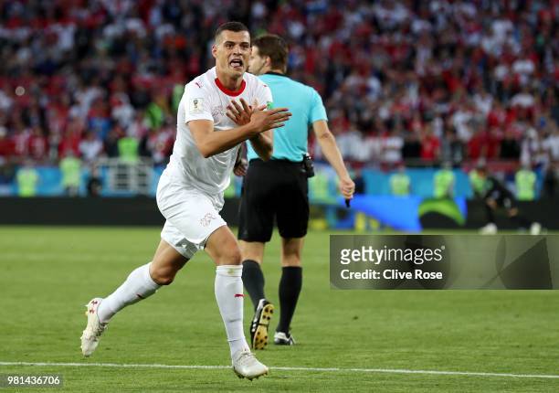 Granit Xhaka of Switzerland celebrates after scoring his team's first goal during the 2018 FIFA World Cup Russia group E match between Serbia and...