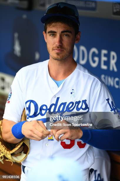 Los Angeles Dodgers first baseman Cody Bellinger looks on from the dugout during a MLB game on Father's Day between the San Francisco Giants and the...