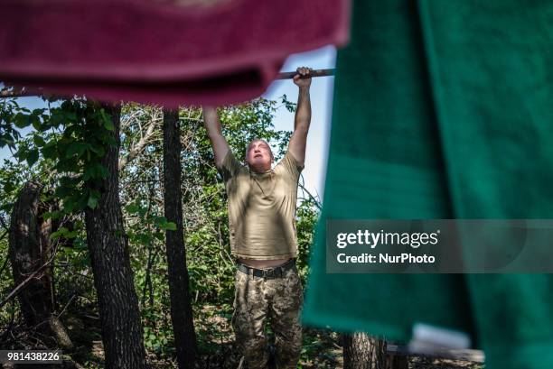 Soldiers of the Ukrainian army on the front line during the Joint Forces Operation in Donbass area, Luhansk region, Ukraine, on June 2018. During the...