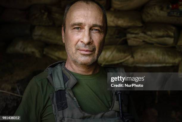 Soldiers of the Ukrainian army on the front line during the Joint Forces Operation in Donbass area, Luhansk region, Ukraine, on June 2018. During the...