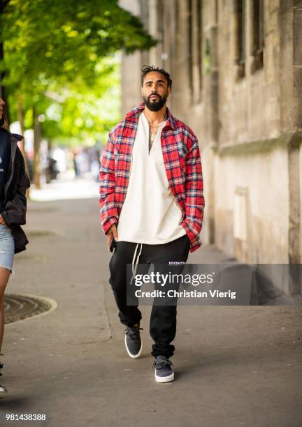 Jerry Lorenzo wearing lumberjack plaid jacket is seen outside Maison Margiela on day four of Paris Fashion Week Menswear SS19 on June 22, 2018 in...