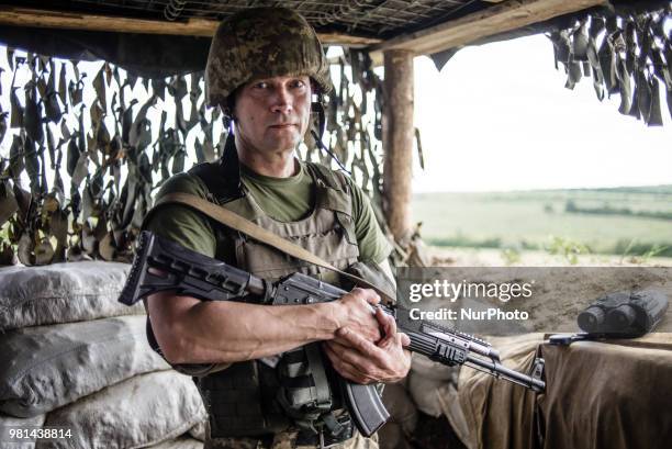 Soldiers of the Ukrainian army on the front line during the Joint Forces Operation in Donbass area, Luhansk region, Ukraine, on June 2018. During the...