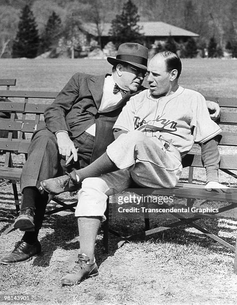 Branch Rickey confides in Leo Durocher during a practice session at spring training for the Brooklyn Dodgers at Bear Mountain, New York in March of...