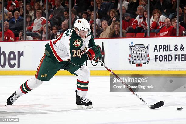 Antti Meittinen of the Minnesota Wild skates in on a break-away against the Detroit Red Wings during an NHL game at Joe Louis Arena on March 26, 2010...