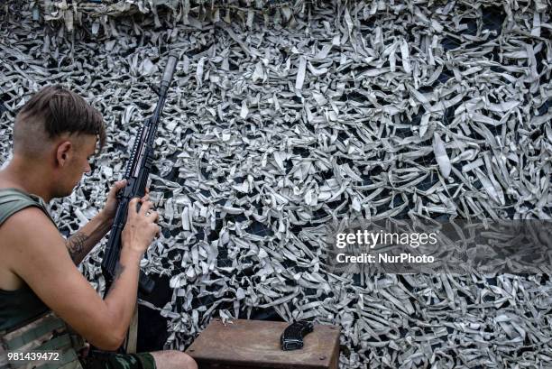 Soldiers of the Ukrainian army on the front line during the Joint Forces Operation in Donbass area, Luhansk region, Ukraine, on June 2018. During the...