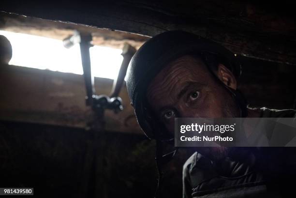 Soldiers of the Ukrainian army on the front line during the Joint Forces Operation in Donbass area, Luhansk region, Ukraine, on June 2018. During the...