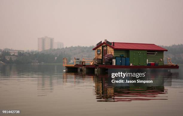 smokey morning on the lake - vastergotland stock pictures, royalty-free photos & images