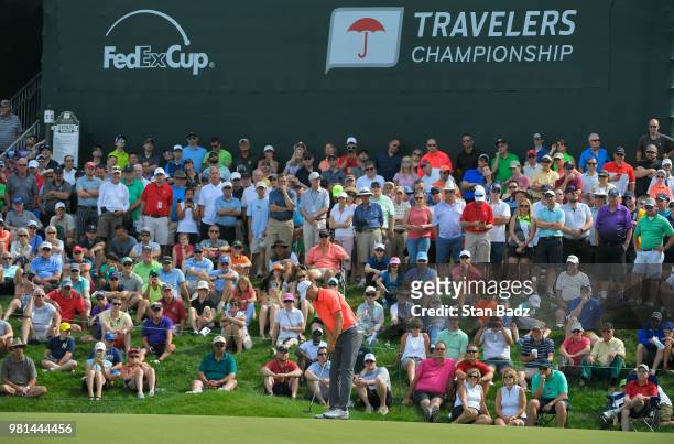 Jordan Spieth hits a putt on the 15th hole during the second round of the Travelers Championship at TPC River Highlands on June 22, 2018 in Cromwell,...