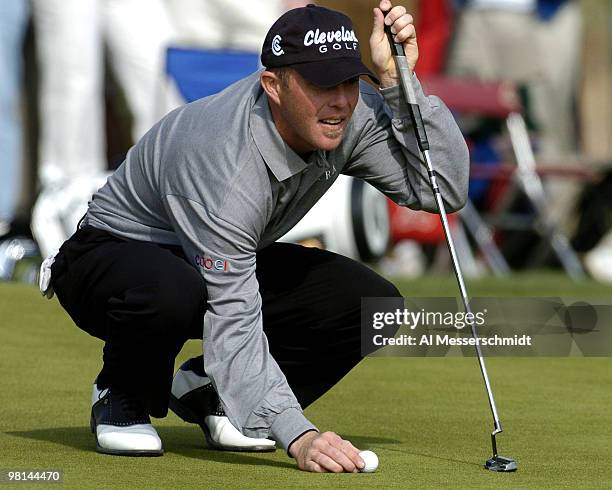 Jonathan Kaye lines up a putt during third round competition January 31, 2004 at the 2004 FBR Open at the Tournament Players Club at Scottsdale,...