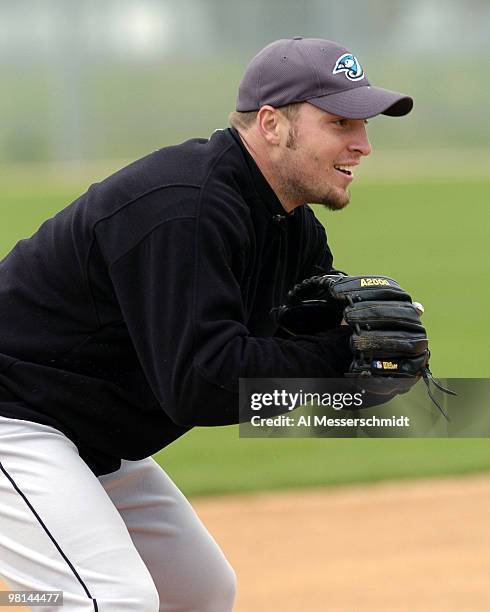 Third baseman Eric Hinske waits for a ball during spring training drills at the Toronto Blue Jays camp in Dunedin, Florida February 27, 2004.