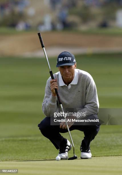 Bernhard Langer lines up a putt during third round competition January 31, 2004 at the 2004 FBR Open at the Tournament Players Club at Scottsdale,...