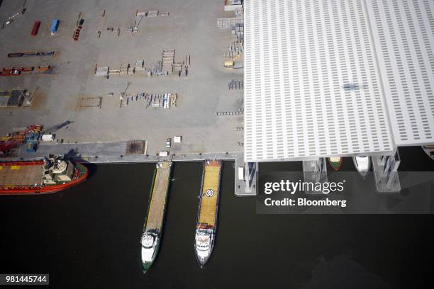 Platform support vessels sit docked at Port Fourchon in this aerial photograph taken over Lafourche Parish, Louisiana, U.S., on Friday, May 18, 2018....