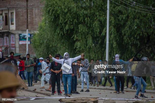 Kashmir protesters dare Indian government forces during a protest on June 22, 2018 in Srinagar, the summer capital of Indian administered Kashmir,...