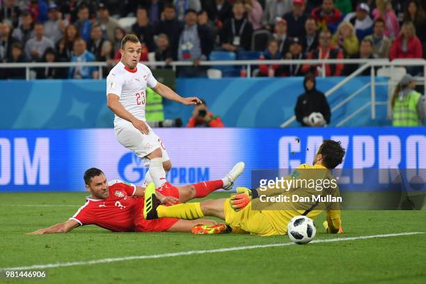 Xherdan Shaqiri of Switzerland scores his team's second goal pass Vladimir Stojkovic of Serbia during the 2018 FIFA World Cup Russia group E match...