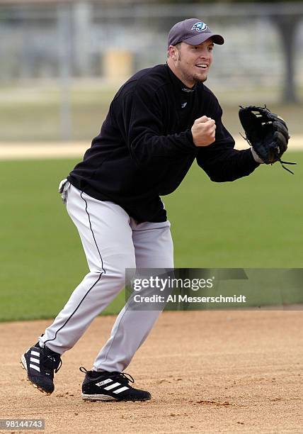 Third baseman Eric Hinske field a ball durng spring training at the Toronto Blue Jays camp in Dunedin, Florida February 27, 2004.