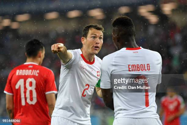 Stephan Lichtsteiner of Switzerland gives instrctions to teammate Breel Embolo during the 2018 FIFA World Cup Russia group E match between Serbia and...