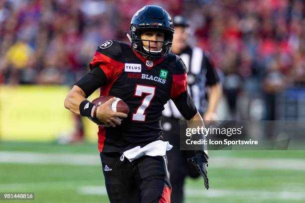 Ottawa RedBlacks quarterback Trevor Harris runs with the football during Canadian Football League action between Saskatchewan Roughriders and Ottawa...