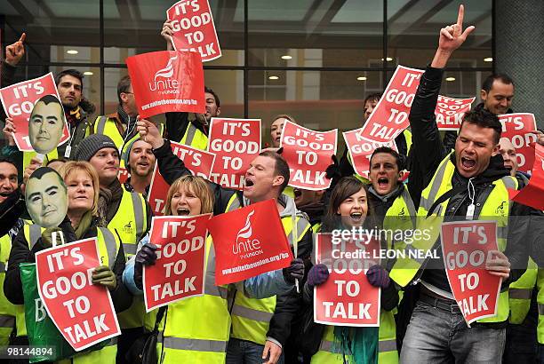 Members of the Unite Union hold a photocall on the steps of the Trade Union Congress headquarters in central London on March 30 on the final day of a...