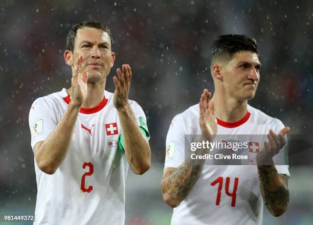 Stephan Lichtsteiner of Switzerland applauds fans following his sides victory in the 2018 FIFA World Cup Russia group E match between Serbia and...