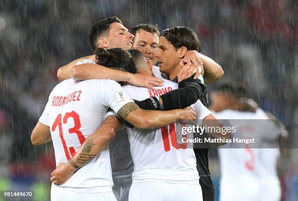 Switzerland players celebrate following their sides victory in the 2018 FIFA World Cup Russia group E match between Serbia and Switzerland at...