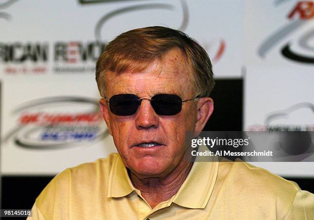 Washington Redskins football coach Joe Gibbs talks to the media before the NASCAR Nextel Cup Series Chevy American Revolution 400 at Richmond...