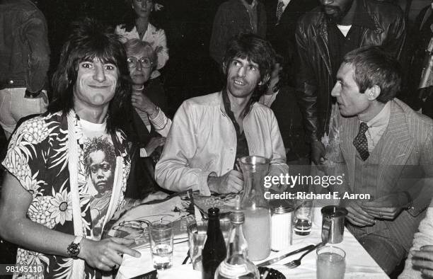 Ron Wood Keith Richards and Charlie Watts posed at the launch party for the Rolling Stones album 'Love You Live' at Trax in New York in September 1977