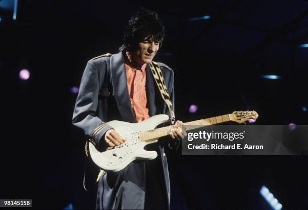 Ronnie Wood from The Rolling Stones performs live on stage at the Memorial Coliseum in Los Angeles in October 1989