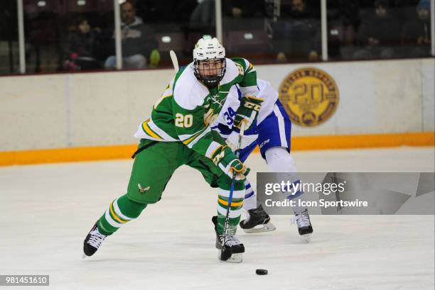 Edina Hornets defenseman Mike Vorlicky skates the puck against the Minnetonka Skippers during a prep hockey game at Ridder Ice Arena in Minneapolis,...