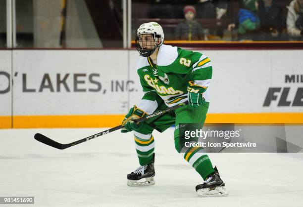 Edina Hornets defenseman Jake Boltmann carries the puck against the Minnetonka Skippers during a prep hockey game at Ridder Ice Arena in Minneapolis,...