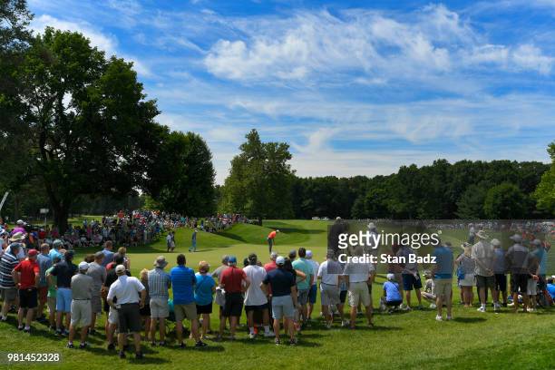 Jordan Spieth hits a putt on the fourth hole during the second round of the Travelers Championship at TPC River Highlands on June 22, 2018 in...