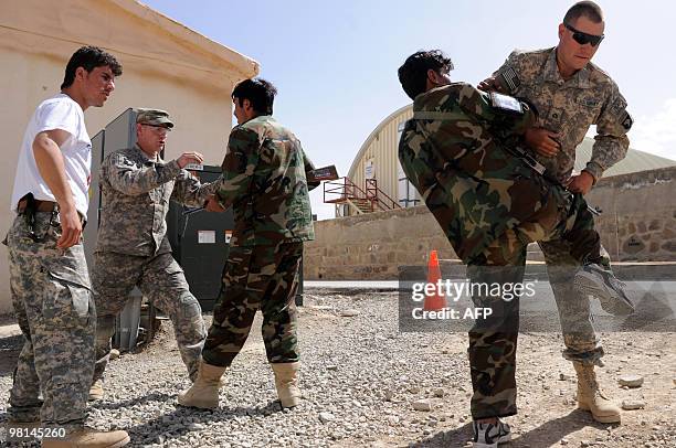 Army soldiers train Afghan National Army soldiers at Forward Operating Base Sharana in Paktika province on March 30, 2010. The top US military...