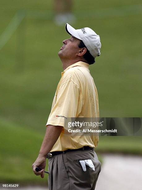 Loren Roberts misses a putt during third-round play at the FedEx St. Jude Classic May 29, 2004 at the Tournament Players Club Southwind, Memphis,...