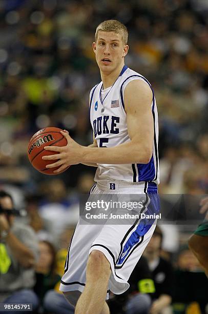 Mason Plumlee of the Duke Blue Devils looks to pass against the Baylor Bears during the south regional final of the 2010 NCAA men's basketball...