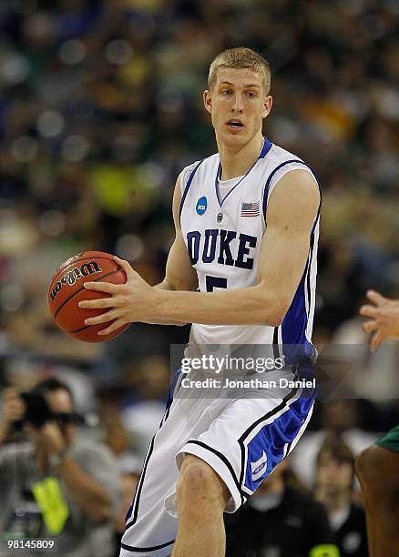 Mason Plumlee of the Duke Blue Devils looks to pass against the Baylor Bears during the south regional final of the 2010 NCAA men's basketball...